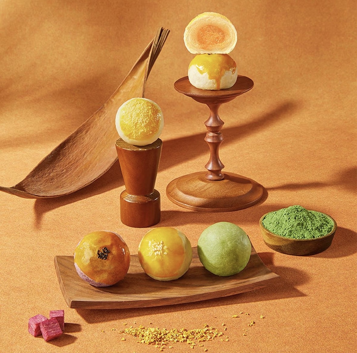 Four-Layer Custard, Mochi & Salted Egg Yolk Mooncakes. A modern take on the beloved Chinese egg-yolk pastry, inspired by the delicate layered tradition of Asian flaky pastries.. A beautifully crafted four-layer filling experience, where del