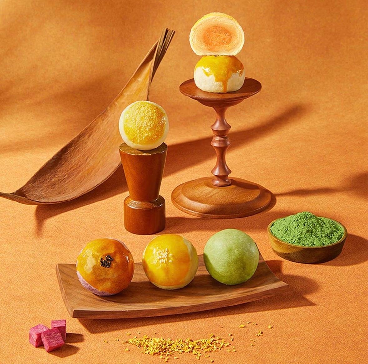 Four-Layer Custard, Mochi & Salted Egg Yolk Mooncakes. A modern take on the beloved Chinese egg-yolk pastry, inspired by the delicate layered tradition of Asian flaky pastries.. A beautifully crafted four-layer filling experience, where del